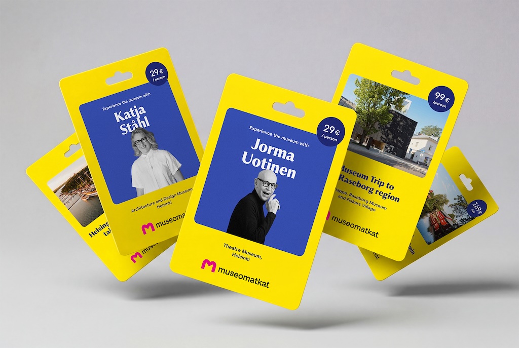 Bright yellow museum cards with blue center panels featuring profiles and names (Katja Ståhl, Jorma Uotinen) and a 29€ price badge; promotional museum experience theme