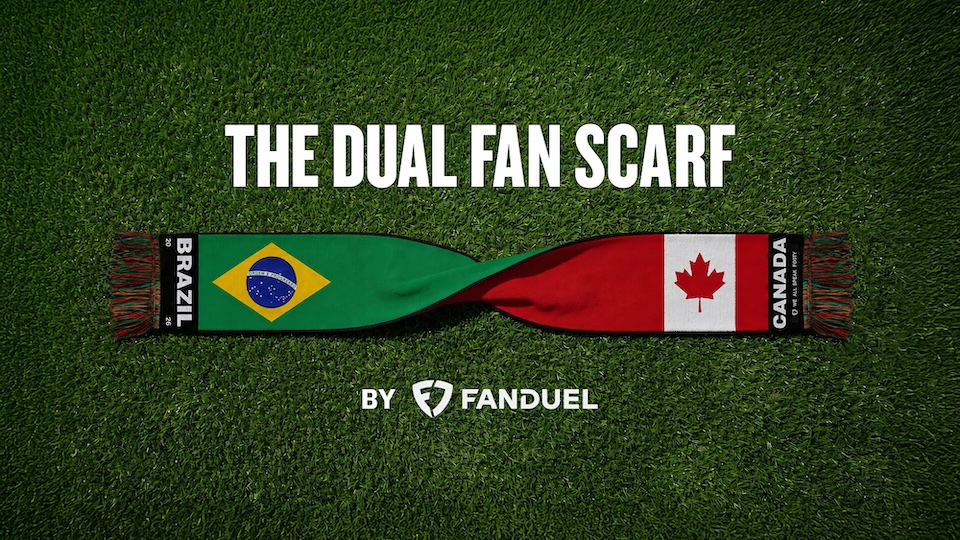 Twisted scarf displaying Brazil and Canada flags on grass, with the text 'THE DUAL FAN SCARF' and 'BY FANDUEL' beneath.
