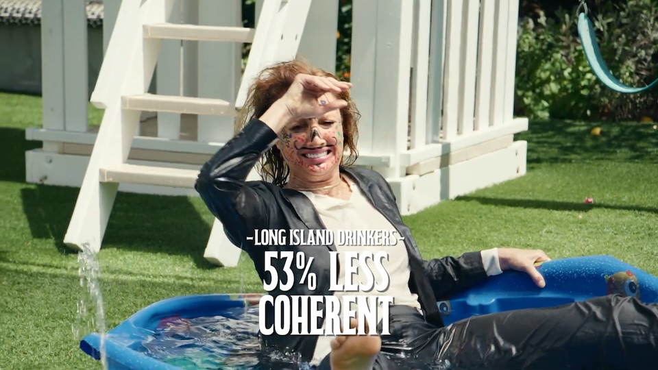tea 5 | Muse by Clios Woman in a black jacket relaxing in a blue kiddie pool outdoors, smeared makeup and a playful pose; bold campaign text reads 'Long Island Drinkers — 53% Less Coherent'.