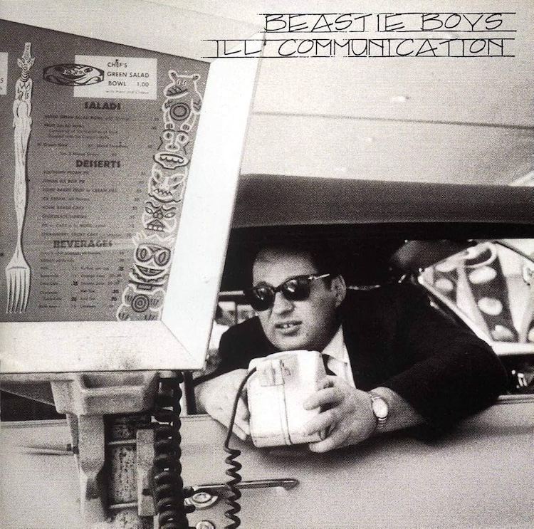 BB_IllCommunication | Muse by Clios Beastie Boys Ill Communication album cover-style photo: man in a suit and sunglasses reaching for a payphone in a retro setting, black and white.