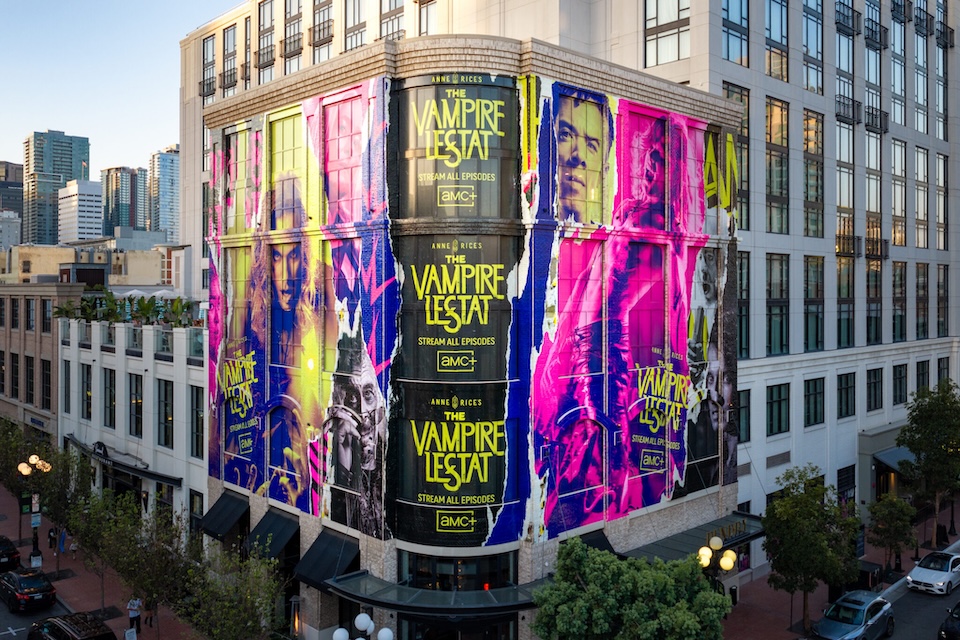 default | Muse by Clios Colorful building mural advertising The Vampire Lestat on a city street.