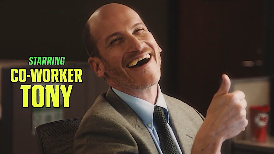 Smiling man in a suit giving a thumbs-up, with bold yellow text 'CO-WORKER TONY' on the left, as a video thumbnail.